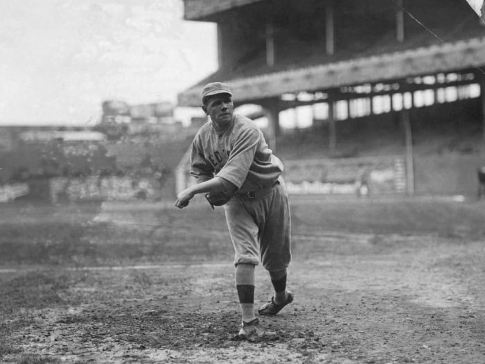 Babe Ruth throwing on the field